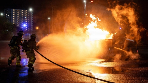 U.S. Air Force 18th Civil Engineer Squadron firefighters extinguish a simulated aircraft fire, during a USAF-led operational exercise, Beverly Midnight 26 at Kadena Air Base, Japan, March 12, 2026. BM26 enhances U.S. interoperability by fostering an exchange of information and refining shared tactics, techniques and procedures to better integrate defense capabilities in support of regional security. (Photo by U.S. Air Force Airman 1st Class Nathaniel Jackson)